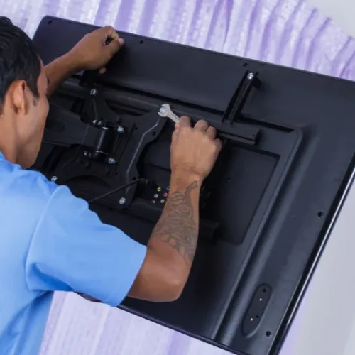 Close up of a rusted TV motherboard showing moisture damage, requiring the best TV repair in Hyderabad.